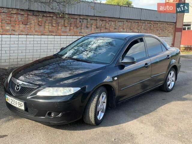 Черный Мазда 6, объемом двигателя 2 л и пробегом 375 тыс. км за 3900 $, фото 3 на Automoto.ua