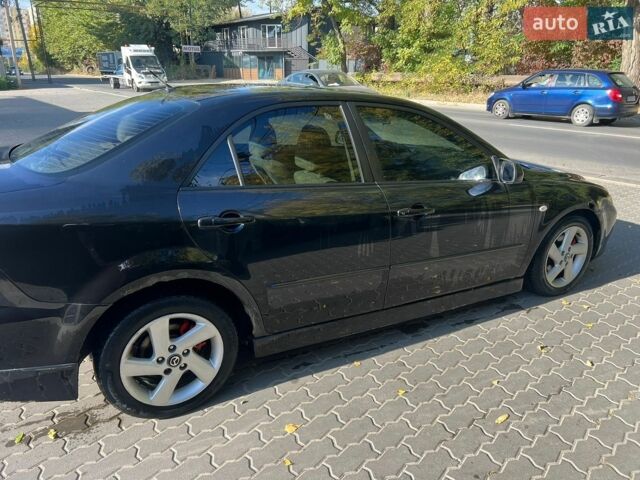 Черный Мазда 6, объемом двигателя 2 л и пробегом 290 тыс. км за 2950 $, фото 5 на Automoto.ua