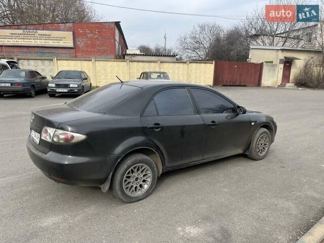 Чорний Мазда 6, об'ємом двигуна 1.8 л та пробігом 200 тис. км за 2000 $, фото 7 на Automoto.ua