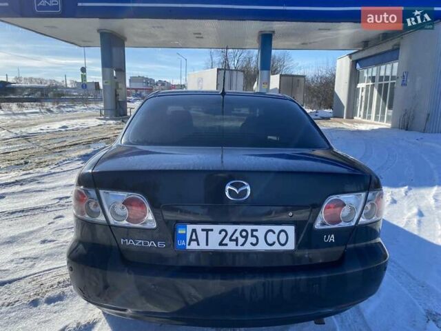 Черный Мазда 6, объемом двигателя 1.8 л и пробегом 260 тыс. км за 3600 $, фото 7 на Automoto.ua