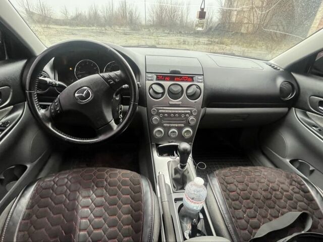 Черный Мазда 6, объемом двигателя 2 л и пробегом 185 тыс. км за 4100 $, фото 5 на Automoto.ua