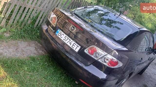 Чорний Мазда 6, об'ємом двигуна 2 л та пробігом 200 тис. км за 3300 $, фото 4 на Automoto.ua