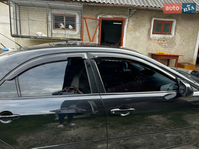 Черный Мазда 6, объемом двигателя 1.8 л и пробегом 210 тыс. км за 4500 $, фото 2 на Automoto.ua