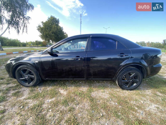 Чорний Мазда 6, об'ємом двигуна 2 л та пробігом 282 тис. км за 3200 $, фото 2 на Automoto.ua