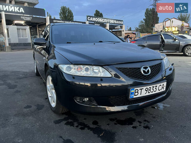 Черный Мазда 6, объемом двигателя 2 л и пробегом 333 тыс. км за 4500 $, фото 8 на Automoto.ua