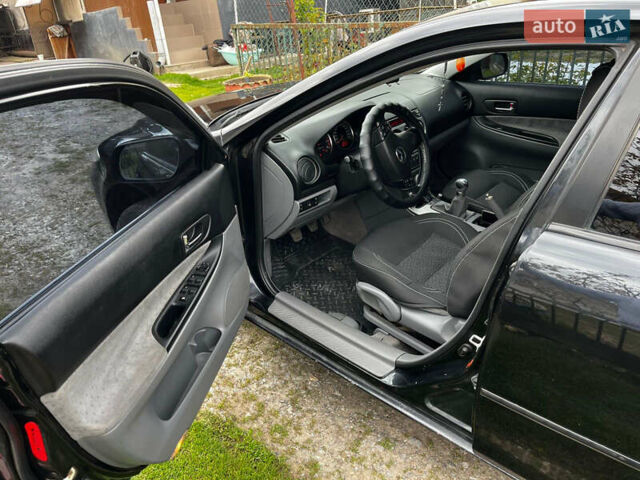 Черный Мазда 6, объемом двигателя 1.8 л и пробегом 210 тыс. км за 4500 $, фото 7 на Automoto.ua