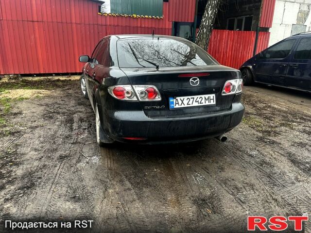 Черный Мазда 6, объемом двигателя 2 л и пробегом 300 тыс. км за 3000 $, фото 1 на Automoto.ua