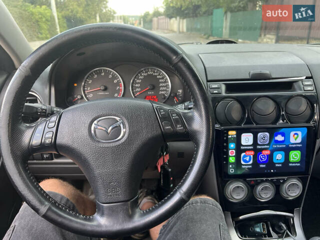 Черный Мазда 6, объемом двигателя 2 л и пробегом 333 тыс. км за 4500 $, фото 7 на Automoto.ua