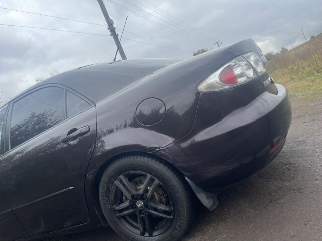 Чорний Мазда 6, об'ємом двигуна 2 л та пробігом 252 тис. км за 3800 $, фото 5 на Automoto.ua