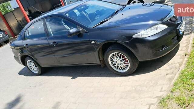 Чорний Мазда 6, об'ємом двигуна 2 л та пробігом 200 тис. км за 3300 $, фото 3 на Automoto.ua