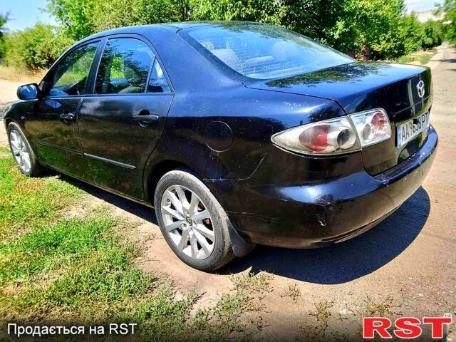 Черный Мазда 6, объемом двигателя 2 л и пробегом 270 тыс. км за 2900 $, фото 1 на Automoto.ua
