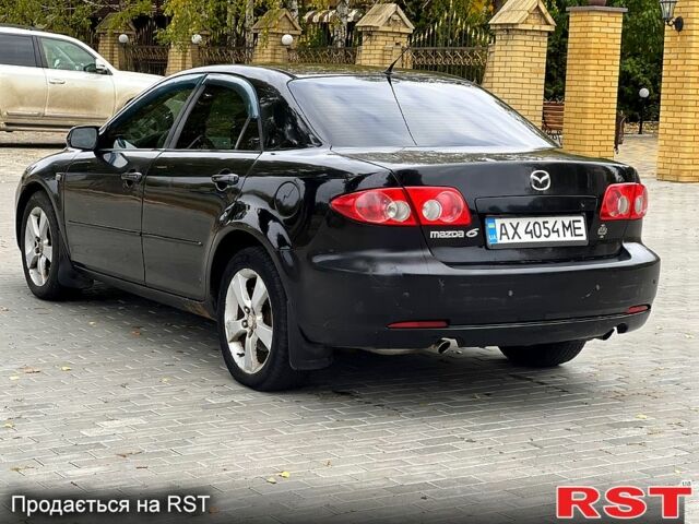 Черный Мазда 6, объемом двигателя 2.3 л и пробегом 250 тыс. км за 3300 $, фото 3 на Automoto.ua