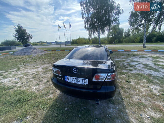 Чорний Мазда 6, об'ємом двигуна 2 л та пробігом 282 тис. км за 3200 $, фото 9 на Automoto.ua