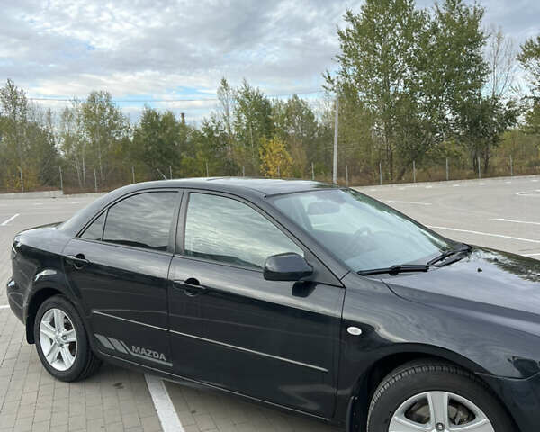 Чорний Мазда 6, об'ємом двигуна 2 л та пробігом 128 тис. км за 6800 $, фото 3 на Automoto.ua