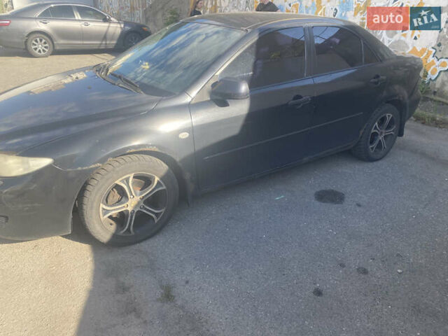 Черный Мазда 6, объемом двигателя 2 л и пробегом 320 тыс. км за 2800 $, фото 1 на Automoto.ua