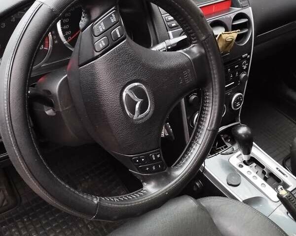 Черный Мазда 6, объемом двигателя 2 л и пробегом 185 тыс. км за 5000 $, фото 12 на Automoto.ua