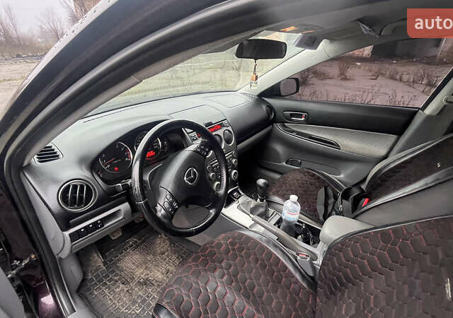 Чорний Мазда 6, об'ємом двигуна 2 л та пробігом 185 тис. км за 4111 $, фото 7 на Automoto.ua