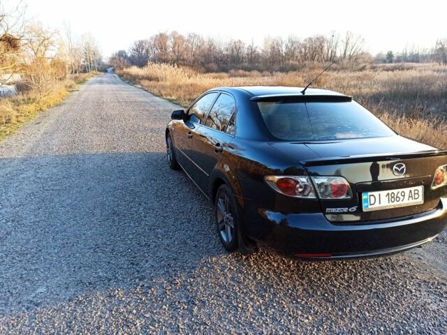 Черный Мазда 6, объемом двигателя 1.8 л и пробегом 200 тыс. км за 4700 $, фото 5 на Automoto.ua