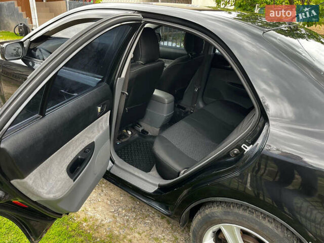 Черный Мазда 6, объемом двигателя 1.8 л и пробегом 210 тыс. км за 4500 $, фото 4 на Automoto.ua