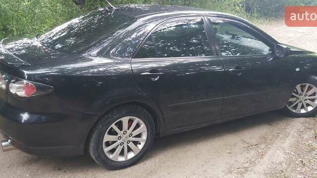 Чорний Мазда 6, об'ємом двигуна 2.26 л та пробігом 269 тис. км за 6000 $, фото 5 на Automoto.ua
