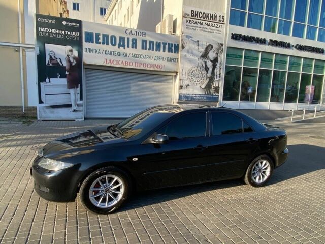 Черный Мазда 6, объемом двигателя 1.8 л и пробегом 235 тыс. км за 3700 $, фото 8 на Automoto.ua