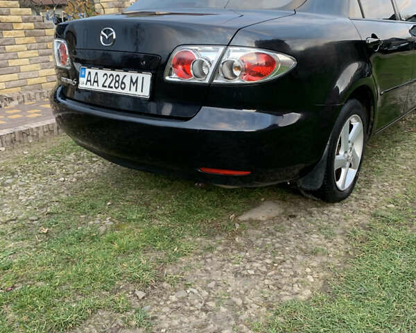 Черный Мазда 6, объемом двигателя 2 л и пробегом 202 тыс. км за 4700 $, фото 2 на Automoto.ua