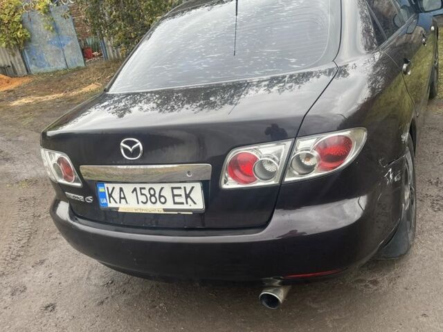Чорний Мазда 6, об'ємом двигуна 2 л та пробігом 252 тис. км за 3800 $, фото 3 на Automoto.ua