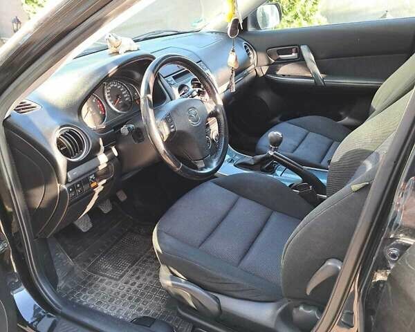 Черный Мазда 6, объемом двигателя 1.8 л и пробегом 234 тыс. км за 5000 $, фото 8 на Automoto.ua