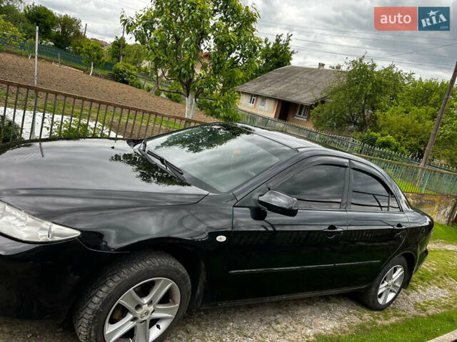 Черный Мазда 6, объемом двигателя 1.8 л и пробегом 210 тыс. км за 4500 $, фото 3 на Automoto.ua