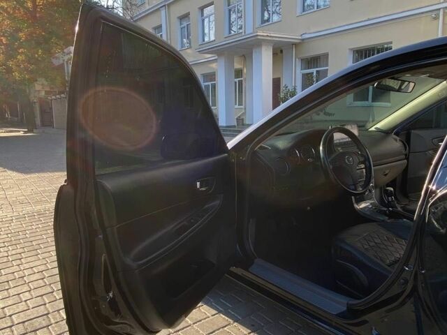 Черный Мазда 6, объемом двигателя 1.8 л и пробегом 235 тыс. км за 3700 $, фото 4 на Automoto.ua