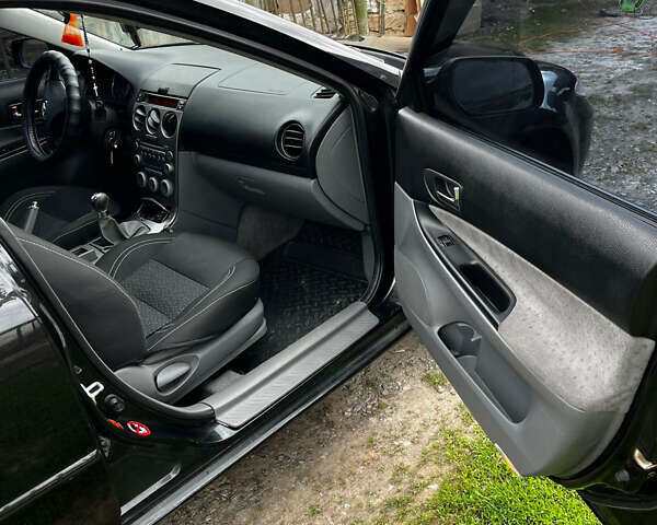 Черный Мазда 6, объемом двигателя 1.8 л и пробегом 210 тыс. км за 4500 $, фото 10 на Automoto.ua