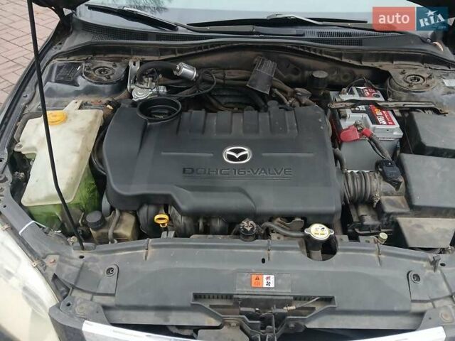 Чорний Мазда 6, об'ємом двигуна 1.8 л та пробігом 305 тис. км за 5000 $, фото 4 на Automoto.ua