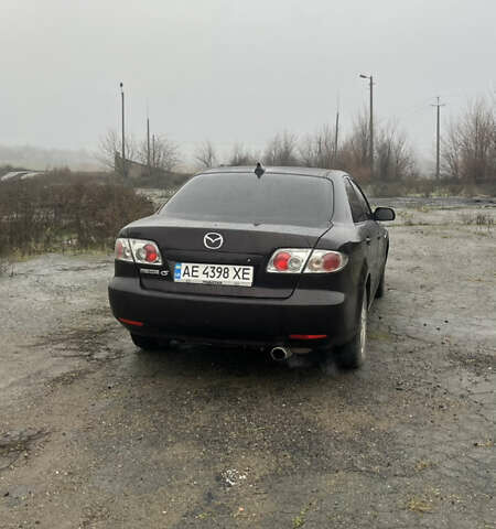 Чорний Мазда 6, об'ємом двигуна 2 л та пробігом 185 тис. км за 4111 $, фото 4 на Automoto.ua