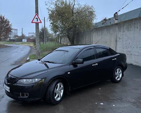 Черный Мазда 6, объемом двигателя 1.8 л и пробегом 301 тыс. км за 3800 $, фото 4 на Automoto.ua