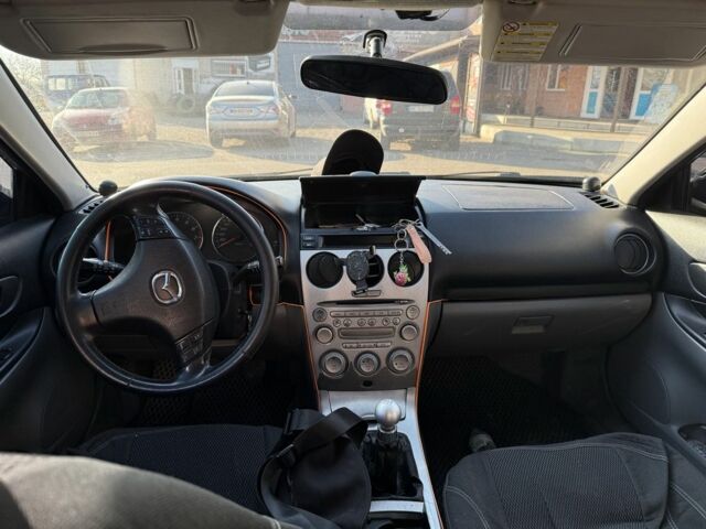 Черный Мазда 6, объемом двигателя 2 л и пробегом 320 тыс. км за 3400 $, фото 7 на Automoto.ua