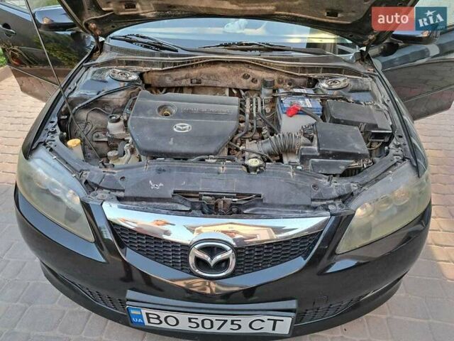 Черный Мазда 6, объемом двигателя 1.8 л и пробегом 234 тыс. км за 5000 $, фото 10 на Automoto.ua