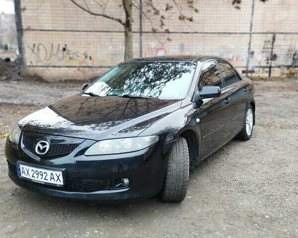 Черный Мазда 6, объемом двигателя 2 л и пробегом 185 тыс. км за 5000 $, фото 1 на Automoto.ua
