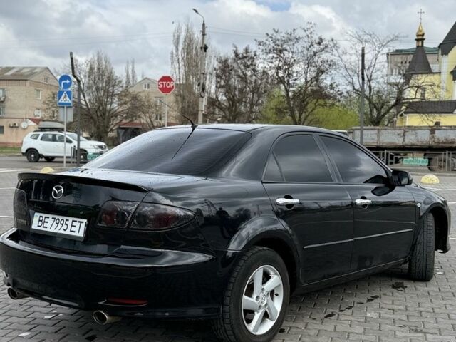 Черный Мазда 6, объемом двигателя 2 л и пробегом 320 тыс. км за 3400 $, фото 3 на Automoto.ua