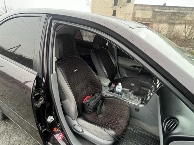 Черный Мазда 6, объемом двигателя 2 л и пробегом 185 тыс. км за 4100 $, фото 6 на Automoto.ua