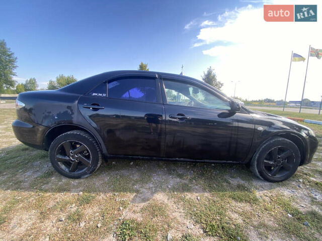 Чорний Мазда 6, об'ємом двигуна 2 л та пробігом 282 тис. км за 3200 $, фото 3 на Automoto.ua