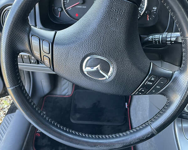 Чорний Мазда 6, об'ємом двигуна 2 л та пробігом 212 тис. км за 5200 $, фото 2 на Automoto.ua