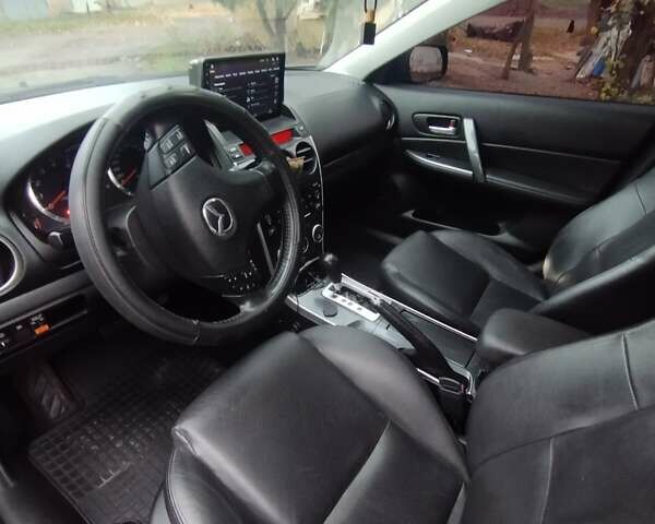 Черный Мазда 6, объемом двигателя 2 л и пробегом 185 тыс. км за 5000 $, фото 10 на Automoto.ua