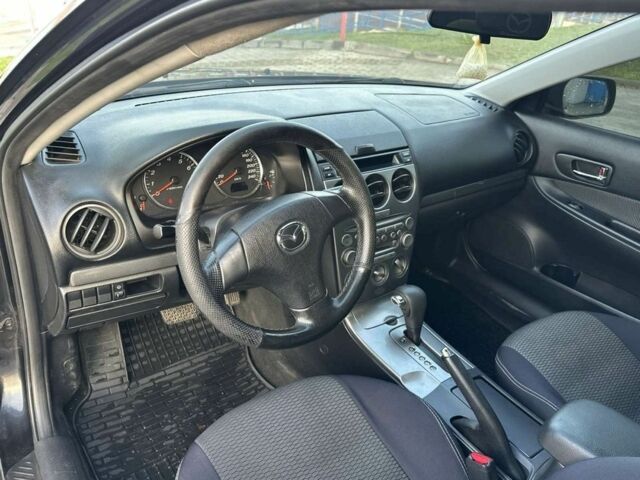 Черный Мазда 6, объемом двигателя 2 л и пробегом 190 тыс. км за 3950 $, фото 9 на Automoto.ua