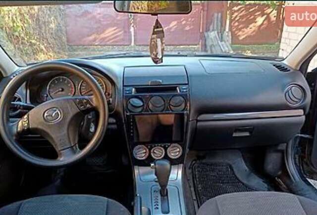 Черный Мазда 6, объемом двигателя 2 л и пробегом 381 тыс. км за 3999 $, фото 2 на Automoto.ua