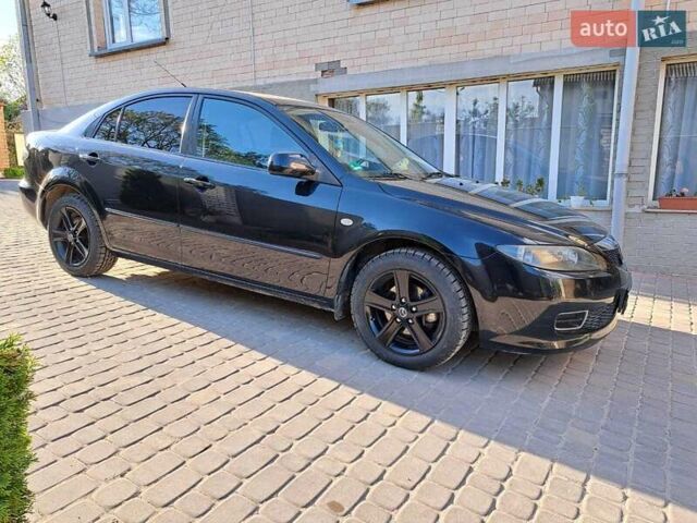 Черный Мазда 6, объемом двигателя 1.8 л и пробегом 234 тыс. км за 5000 $, фото 2 на Automoto.ua