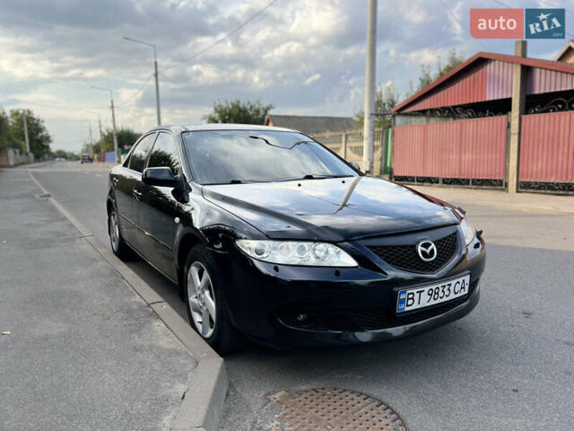 Черный Мазда 6, объемом двигателя 2 л и пробегом 333 тыс. км за 4500 $, фото 1 на Automoto.ua