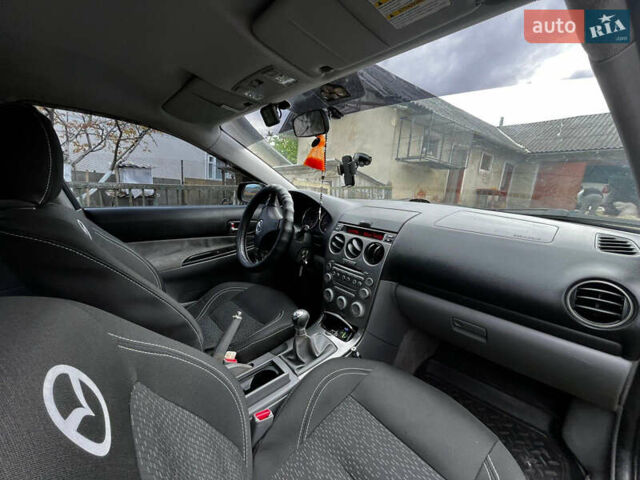 Черный Мазда 6, объемом двигателя 1.8 л и пробегом 210 тыс. км за 4500 $, фото 5 на Automoto.ua