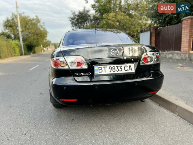 Черный Мазда 6, объемом двигателя 2 л и пробегом 333 тыс. км за 4500 $, фото 3 на Automoto.ua