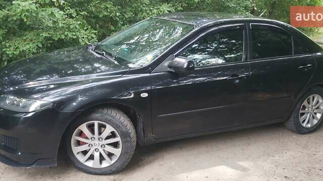 Чорний Мазда 6, об'ємом двигуна 2.26 л та пробігом 269 тис. км за 6000 $, фото 1 на Automoto.ua