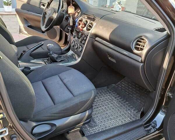 Черный Мазда 6, объемом двигателя 1.8 л и пробегом 234 тыс. км за 5000 $, фото 14 на Automoto.ua